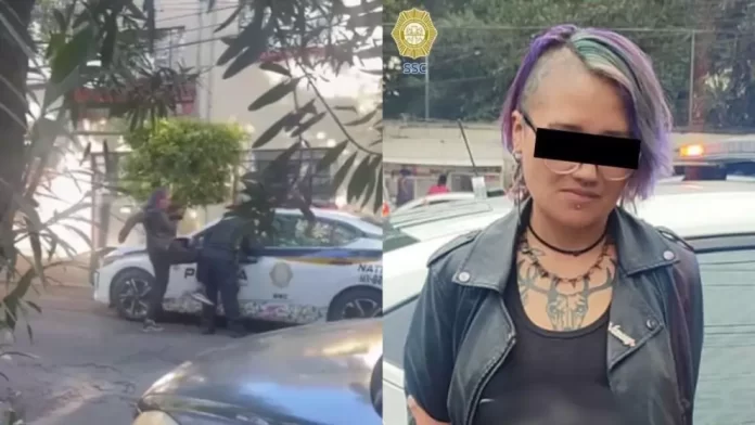 Mujer es captada golpeando a policía en Benito Juárez; SSC detiene a la agresora. Foto: FIA.
