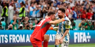 Lionel Messi y Dibu Martínez